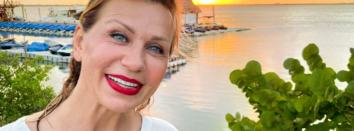 Smiling patient with all-on x dental implants