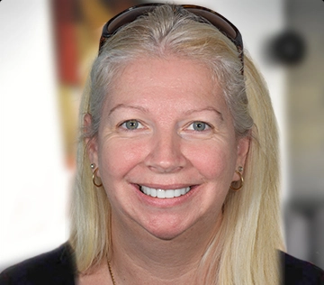 patient with a full set of zirconia crowns